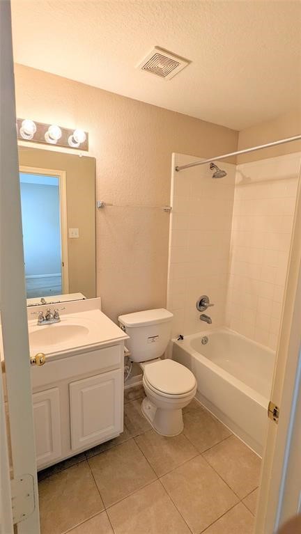 20909 Springport Court Katy, TX 77450 - Photo 26 of 39 Bright and clean bathroom featuring a full bathtub, modern vanity, and sleek tile flooring.