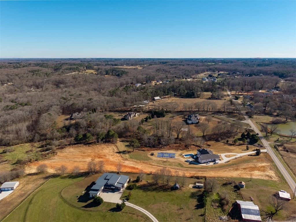 0 Dee Kennedy Road Auburn, GA 30011 - Photo 6 of 13 an aerial view of a residential houses with yard