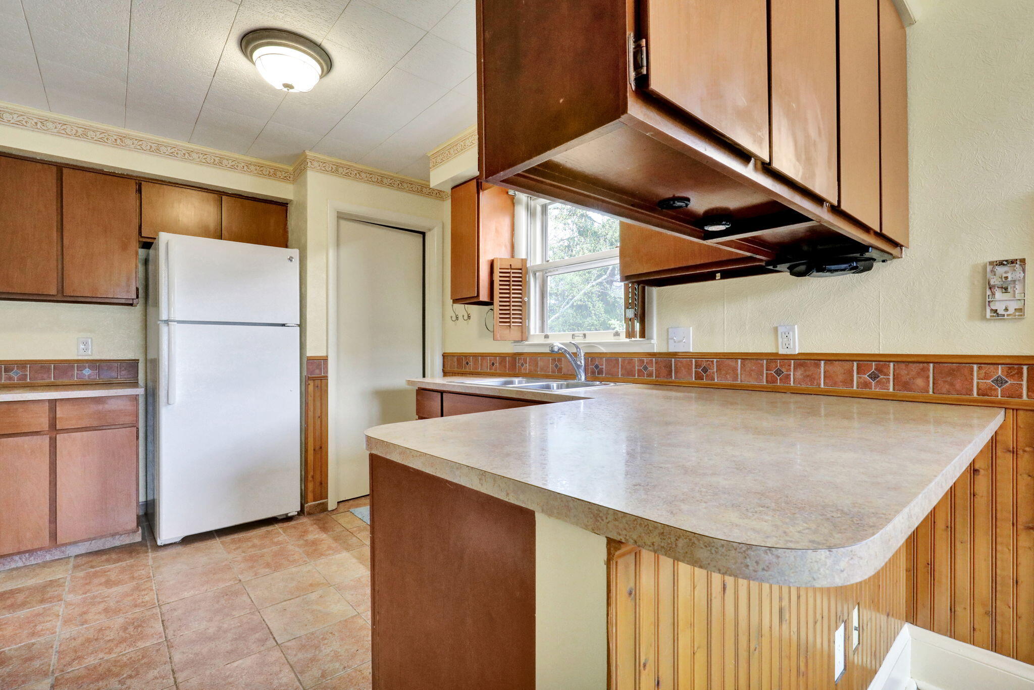 4308 Pleasant Grove Road Lansing, MI 48910 - Photo 9 of 26 12-web-or-mls-Open Ended Media-15