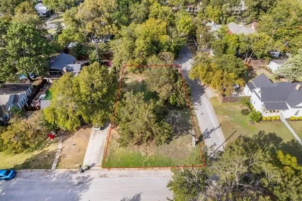 an aerial view of residential house with outdoor space