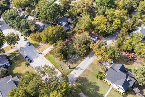 an aerial view of residential house with outdoor space