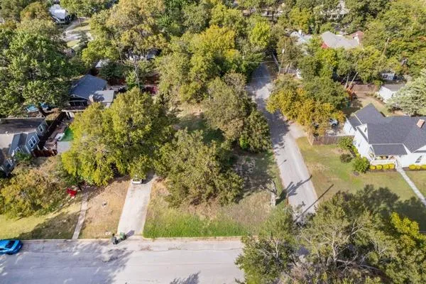 an aerial view of residential house with outdoor space