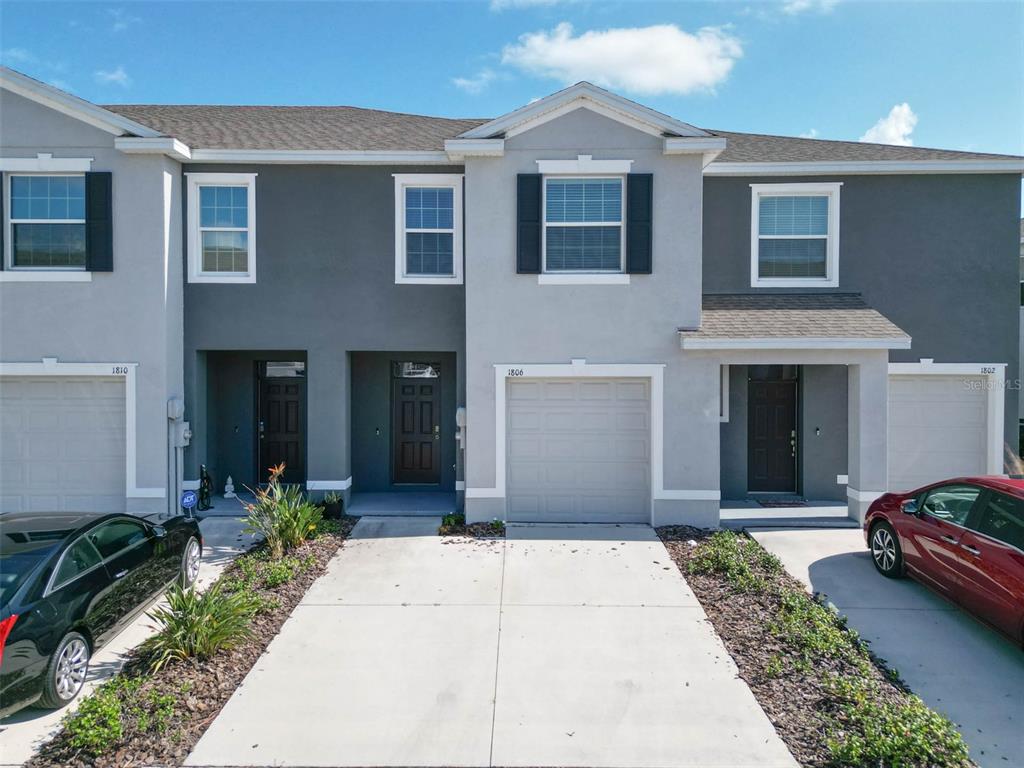 1806 Hovenweep Road Wesley Chapel, FL 33543 - Photo 1 of 1 a front view of a house with a yard