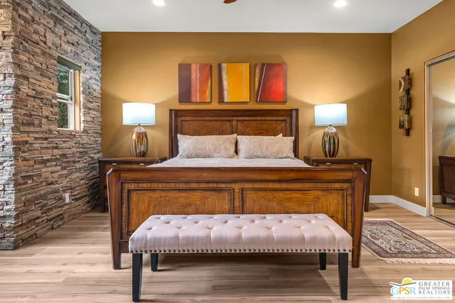 a bathroom with a bathtub and a window