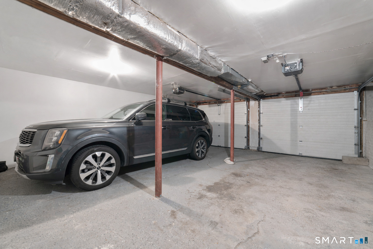 611 Kent Road New Milford, CT 06755 - Photo 31 of 39 oversize 2 car garage with ample storage space