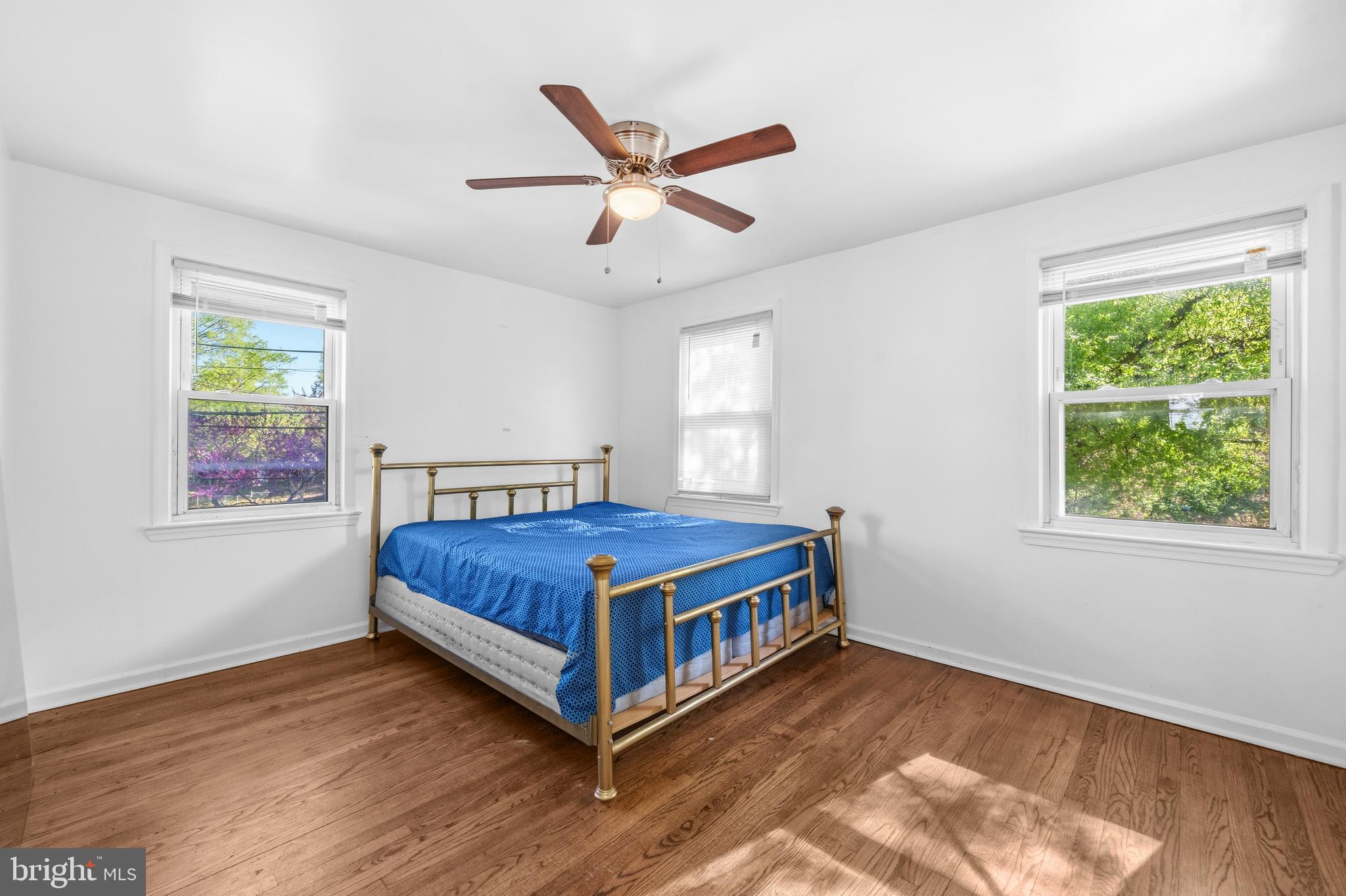 520 49th Street Northeast Washington, DC 20019 - Photo 17 of 38 a bedroom with a bed and window