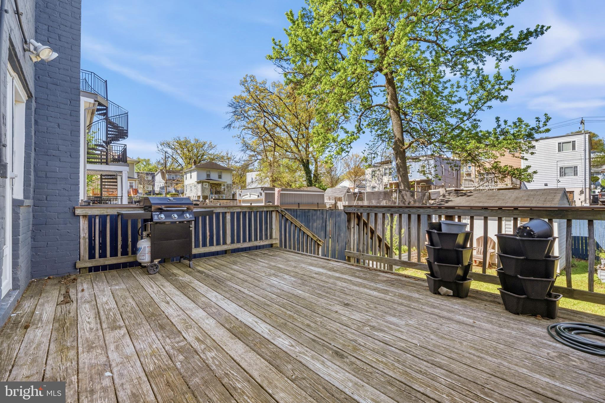 520 49th Street Northeast Washington, DC 20019 - Photo 29 of 38 a view of a deck with wooden floor and fence with a large garden