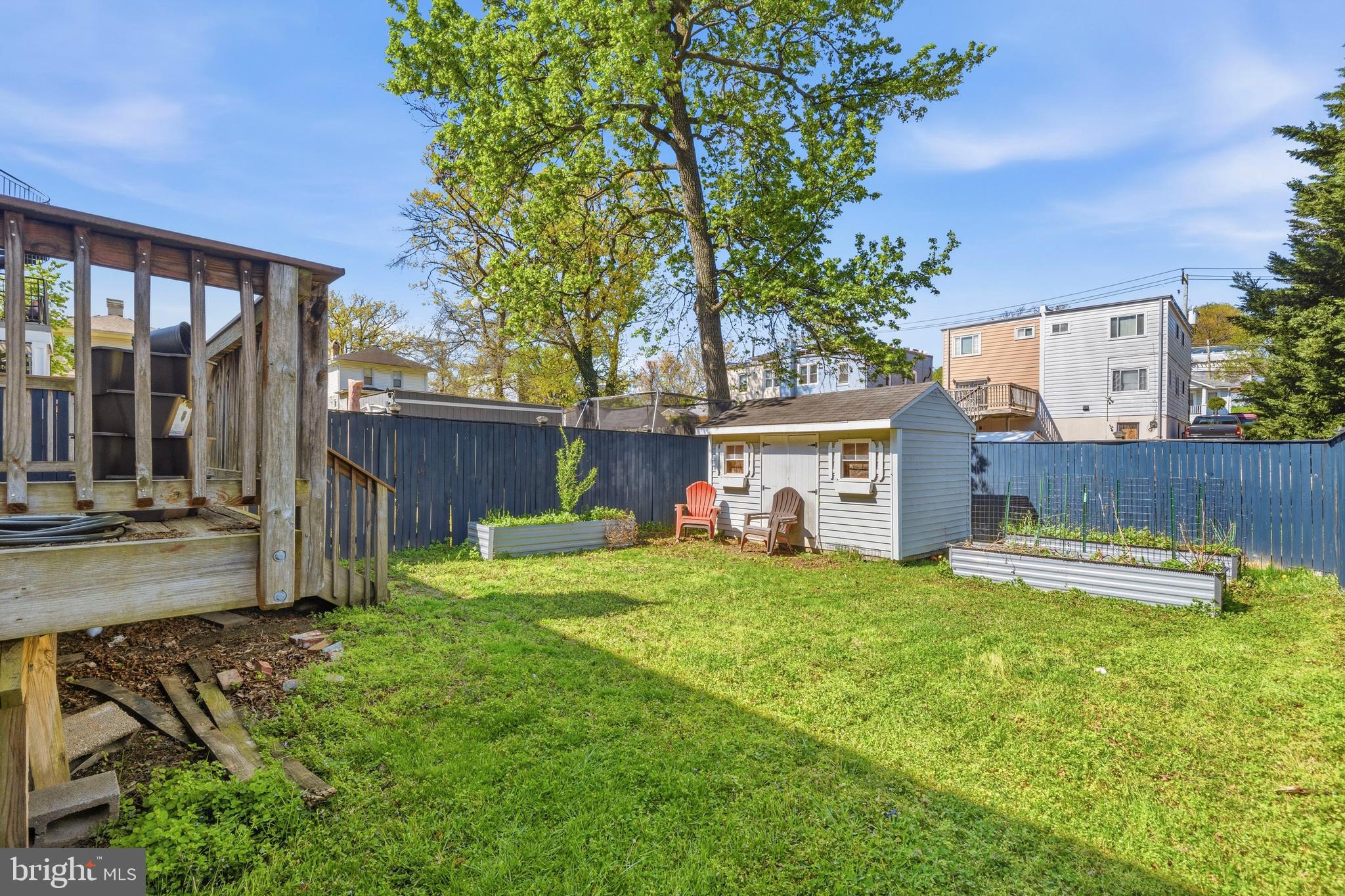 520 49th Street Northeast Washington, DC 20019 - Photo 31 of 38 a view of a house with a yard and sitting area