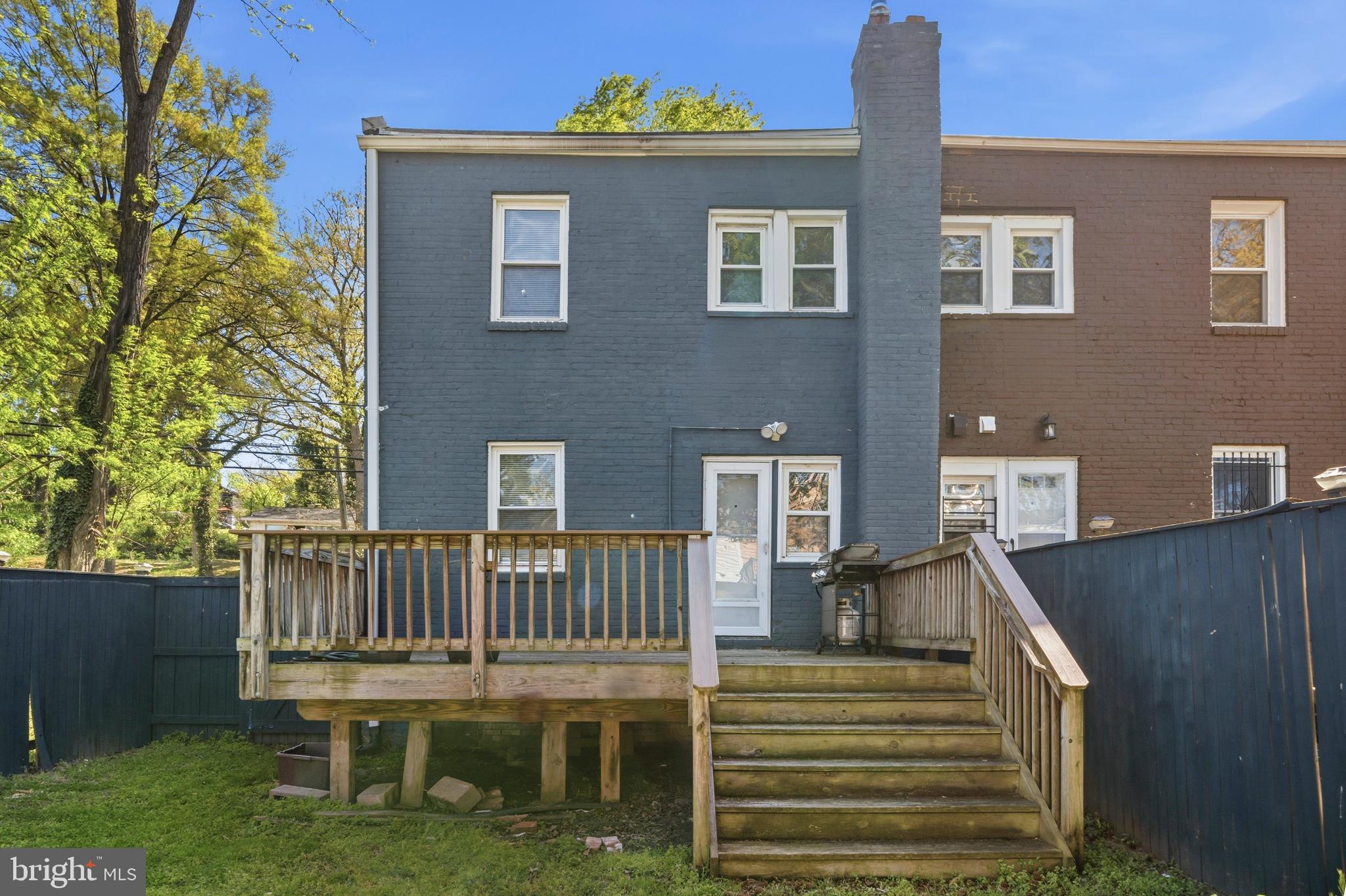 520 49th Street Northeast Washington, DC 20019 - Photo 33 of 38 a view of a house with backyard and deck