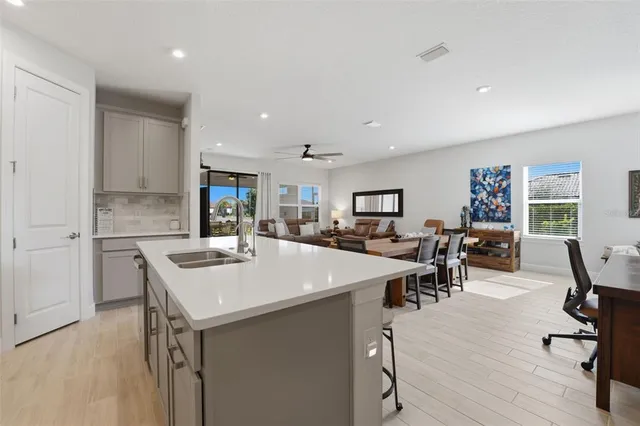 a bathroom with a sink double vanity and a mirror