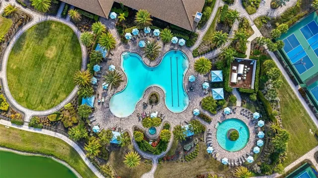a picture of a bathroom with a sink mirror and