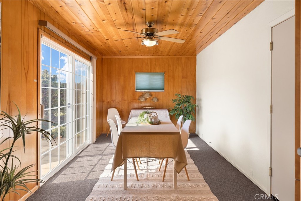 1075 Tracy Lane Chico, CA 95926 - Photo 15 of 29 a dining room with furniture and window
