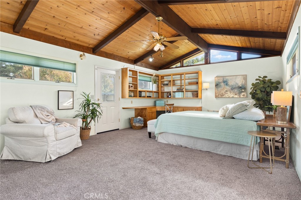 1075 Tracy Lane Chico, CA 95926 - Photo 16 of 29 a bedroom with furniture and a large window