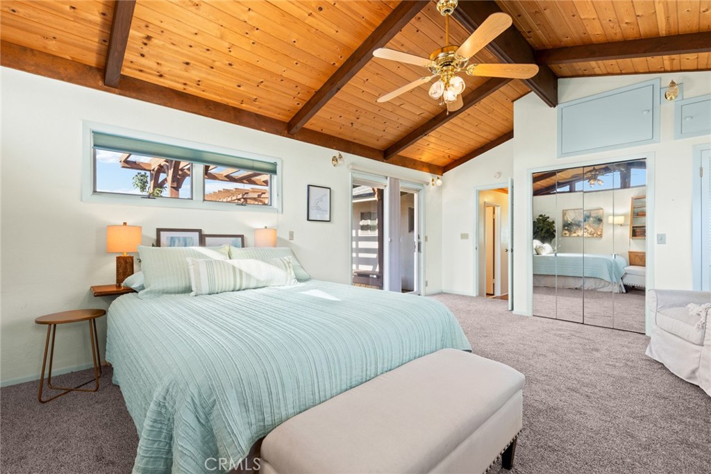 1075 Tracy Lane Chico, CA 95926 - Photo 17 of 29 a bedroom with a bed and a walk in closet