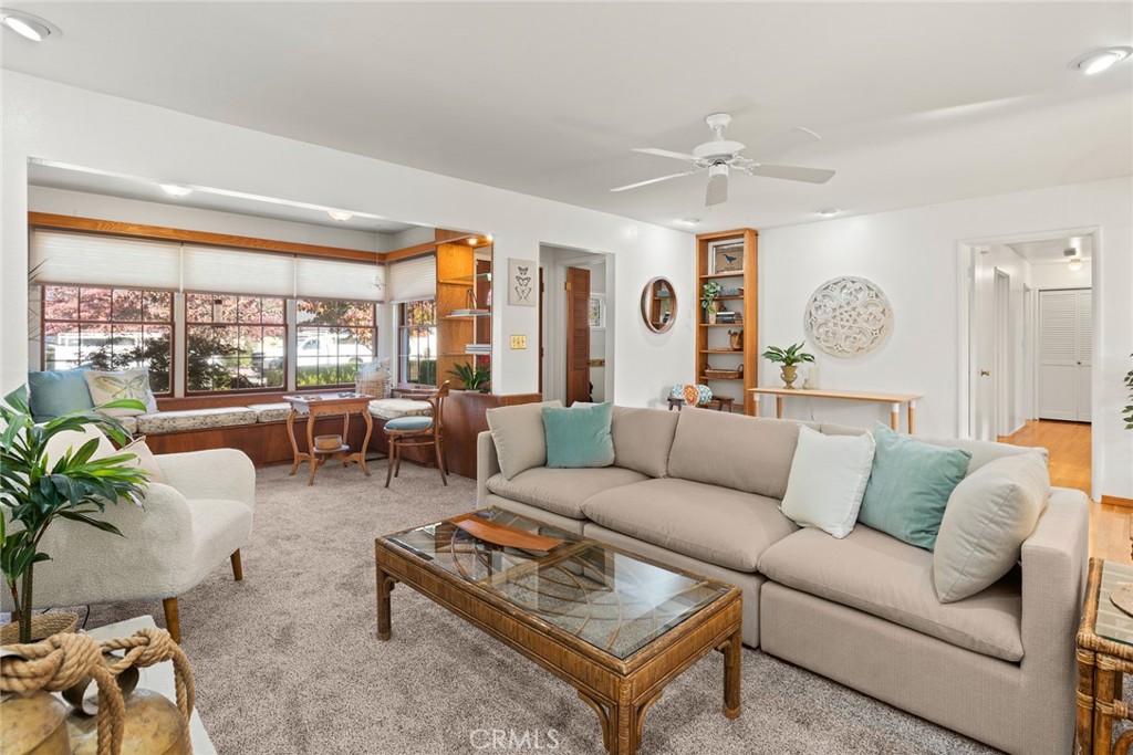 1075 Tracy Lane Chico, CA 95926 - Photo 8 of 29 a living room with furniture and a large window