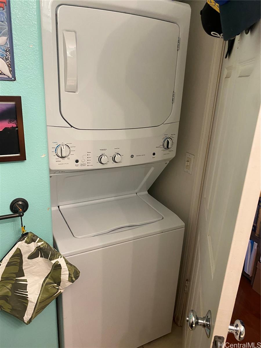 94-510 Lumiaina Street, Unit M103 Waipahu, HI 96797 - Photo 16 of 24 a utility room with dryer and washer