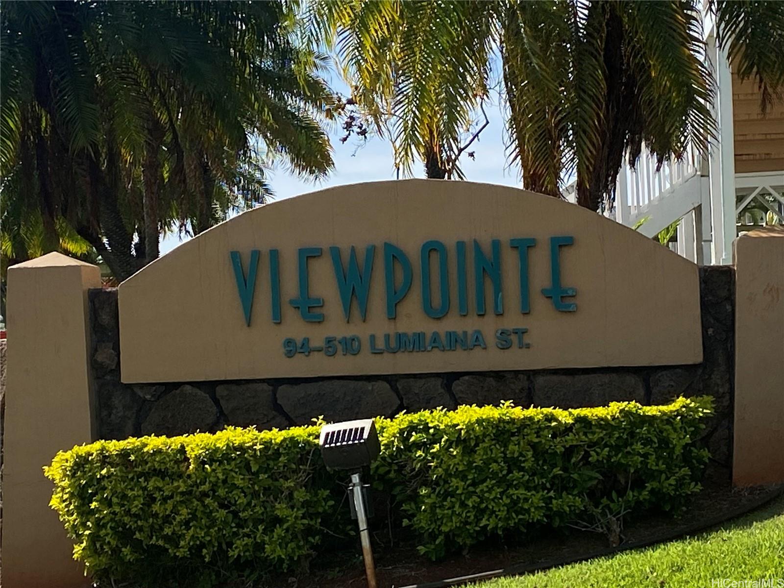 94-510 Lumiaina Street, Unit M103 Waipahu, HI 96797 - Photo 24 of 24 a front view of a house with a yard