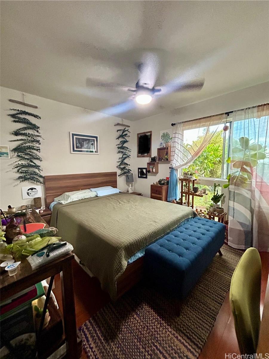 94-510 Lumiaina Street, Unit M103 Waipahu, HI 96797 - Photo 10 of 24 a view of a dining room with furniture window and outside view