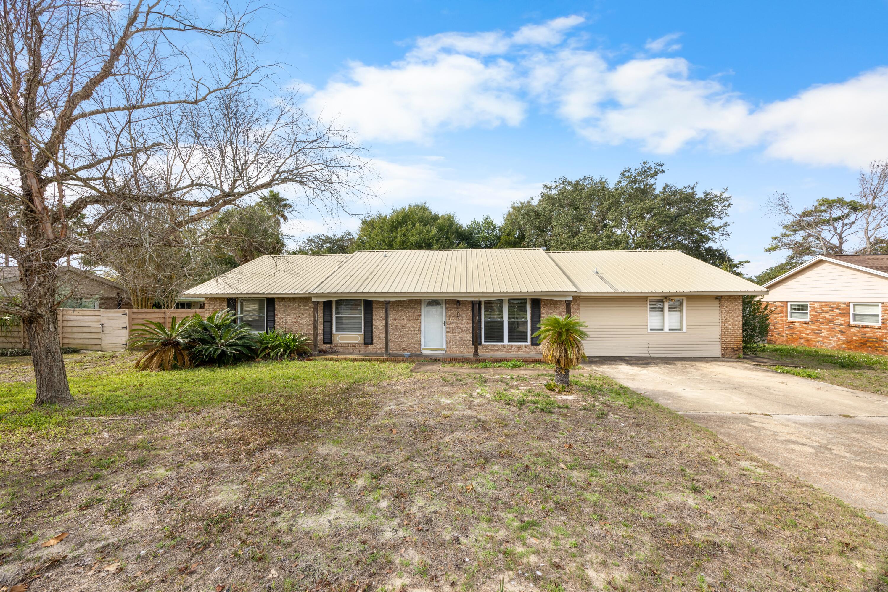 a house with trees in front of it