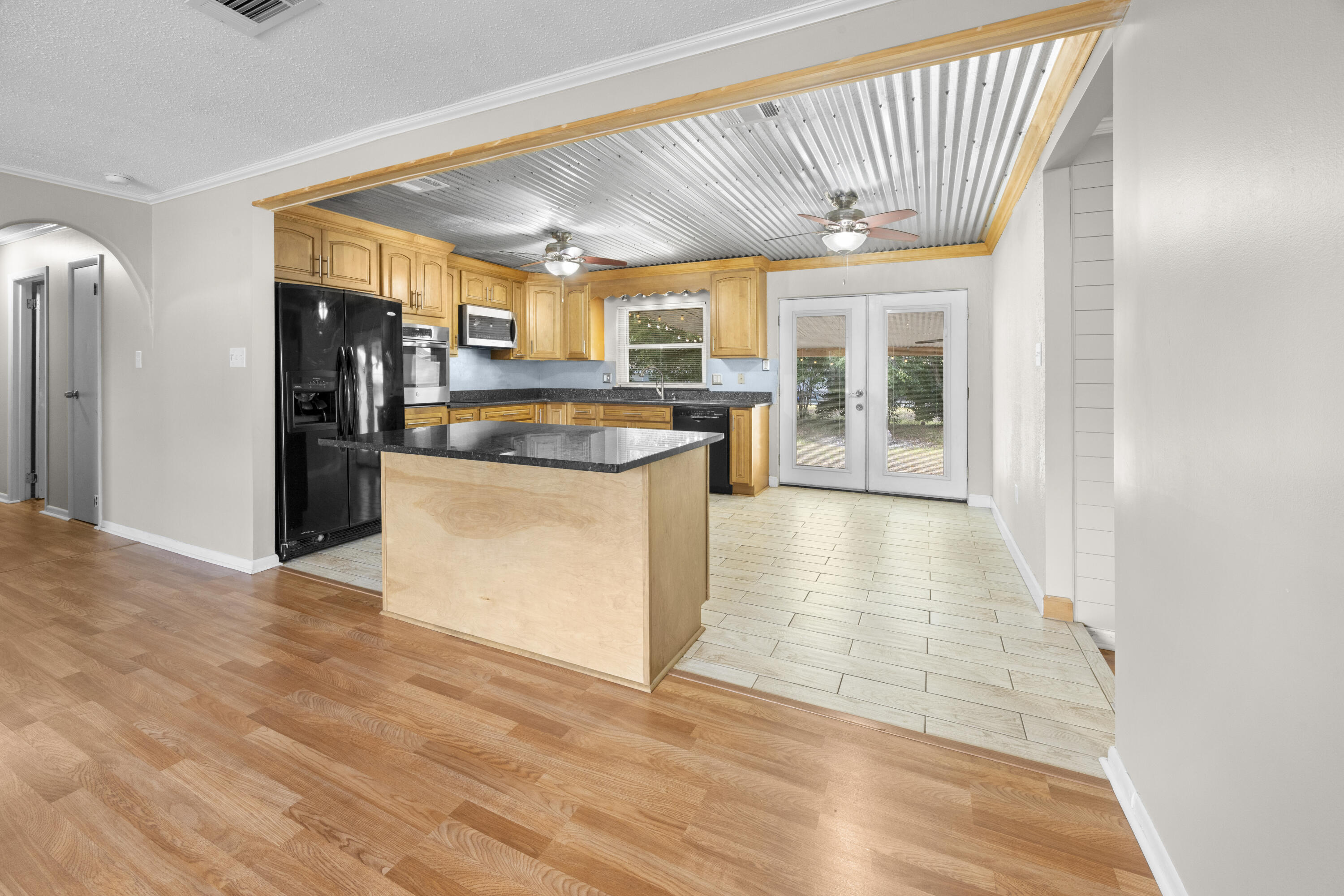 307 Spring Lane Destin, FL 32541 - Photo 18 of 42 a view of a kitchen with a sink and cabinets