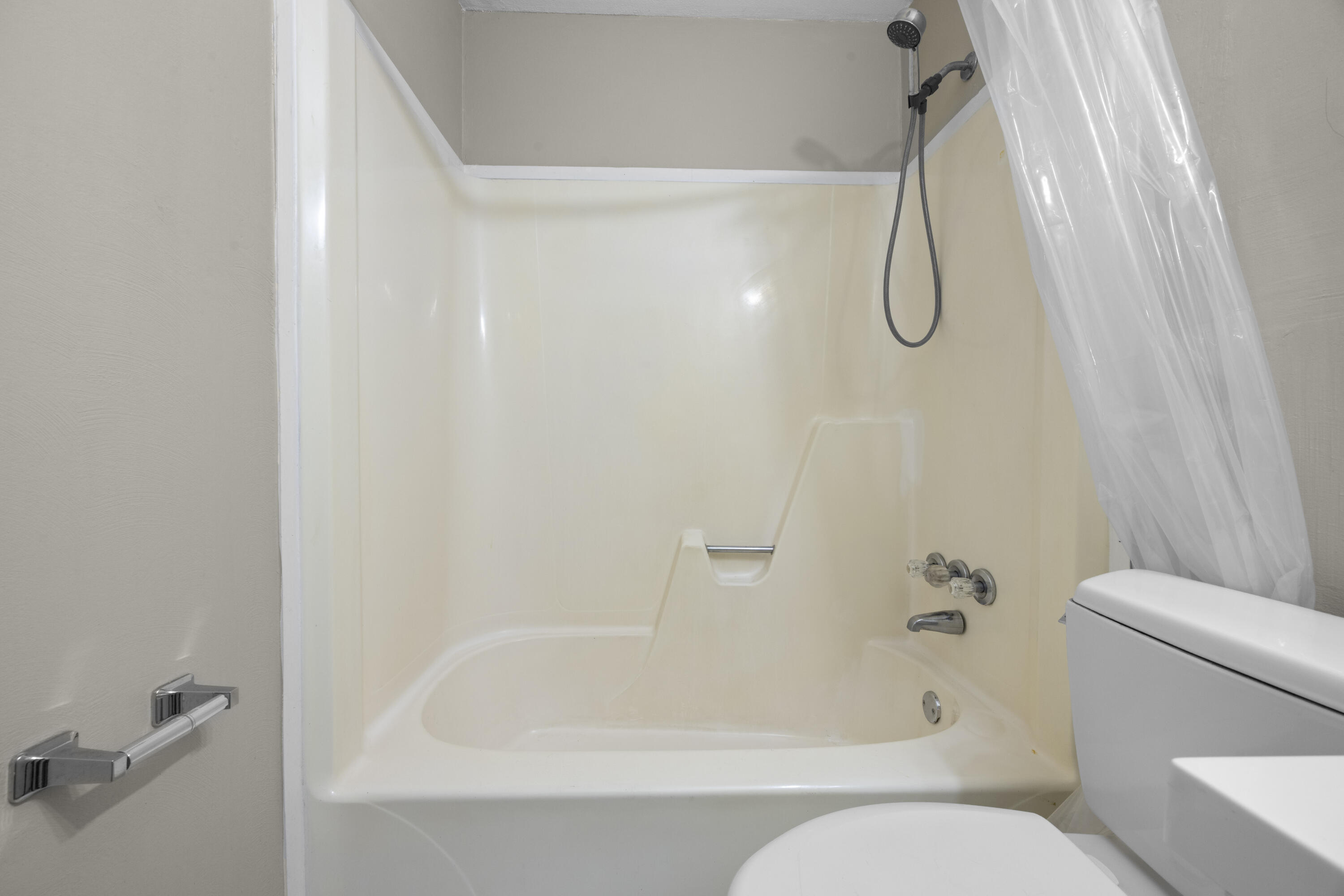 307 Spring Lane Destin, FL 32541 - Photo 27 of 42 a bathroom with a shower and a toilet