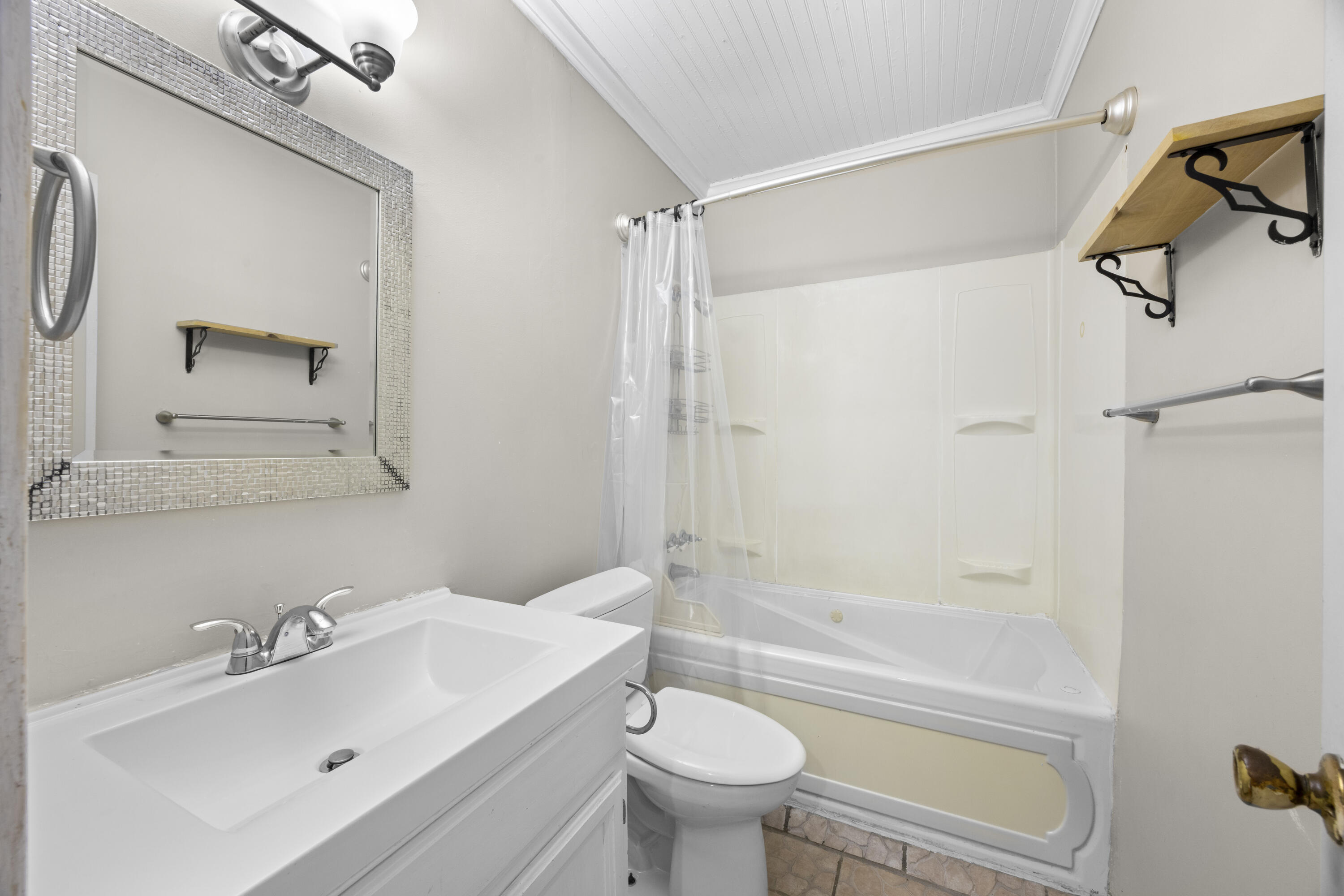 307 Spring Lane Destin, FL 32541 - Photo 33 of 42 a bathroom with a sink toilet and shower