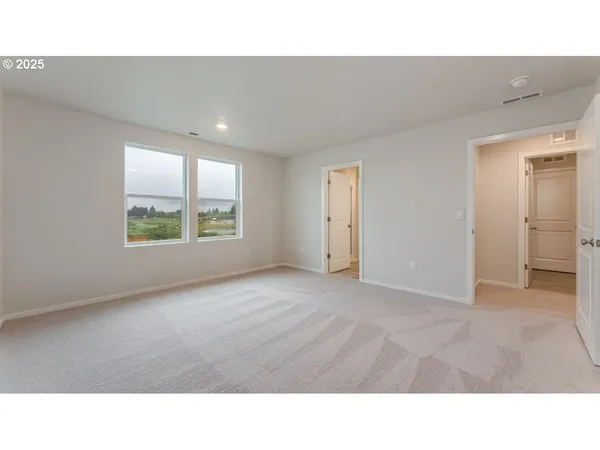 a bathroom with a sink double vanity and a mirror