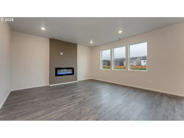 a room with a bed and window