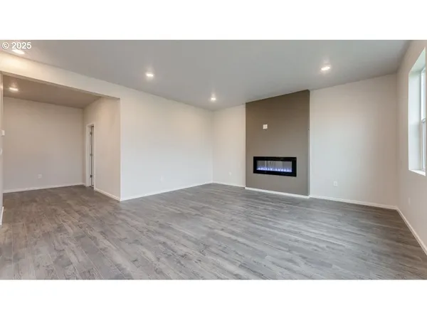a kitchen with appliances a sink and cabinets