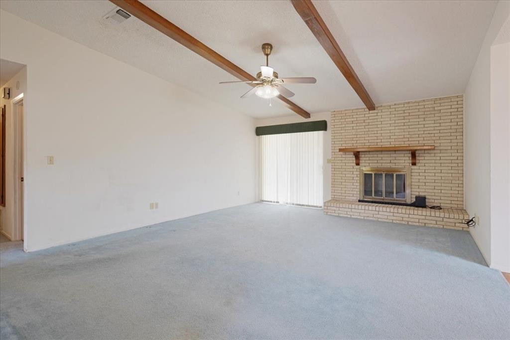 4400 Highway 121 Bonham, TX 75418 - Photo 22 of 40 a view of a livingroom with a ceiling fan and window