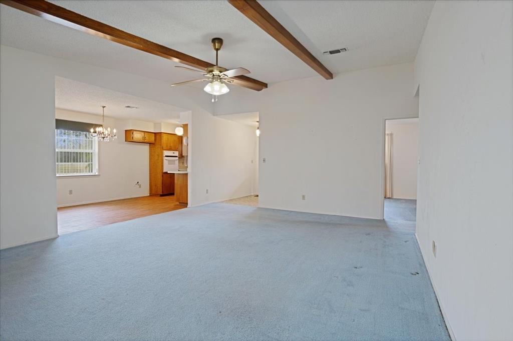 4400 Highway 121 Bonham, TX 75418 - Photo 23 of 40 an empty room with a ceiling fan and a window