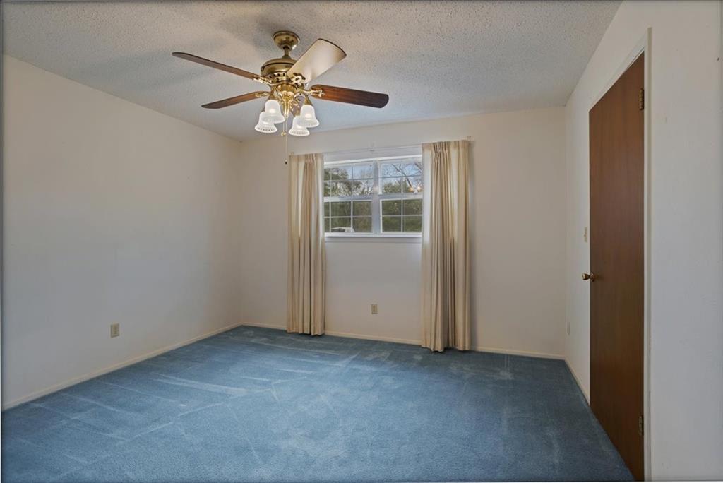 4400 Highway 121 Bonham, TX 75418 - Photo 28 of 40 a view of an empty room with a window
