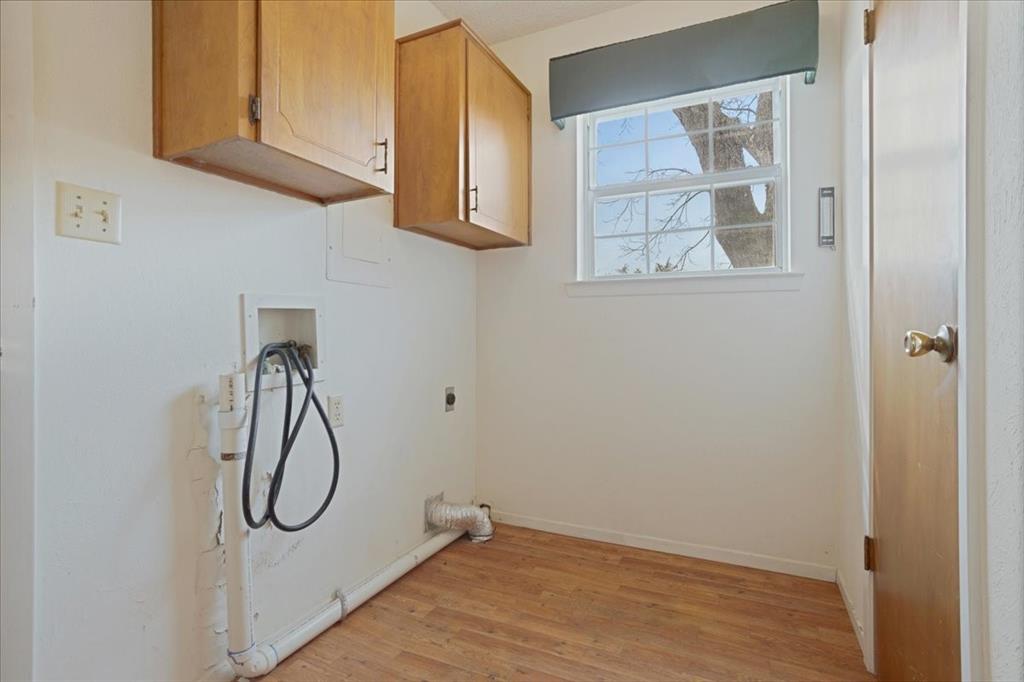 4400 Highway 121 Bonham, TX 75418 - Photo 32 of 40 a view of a room with rack on the wall