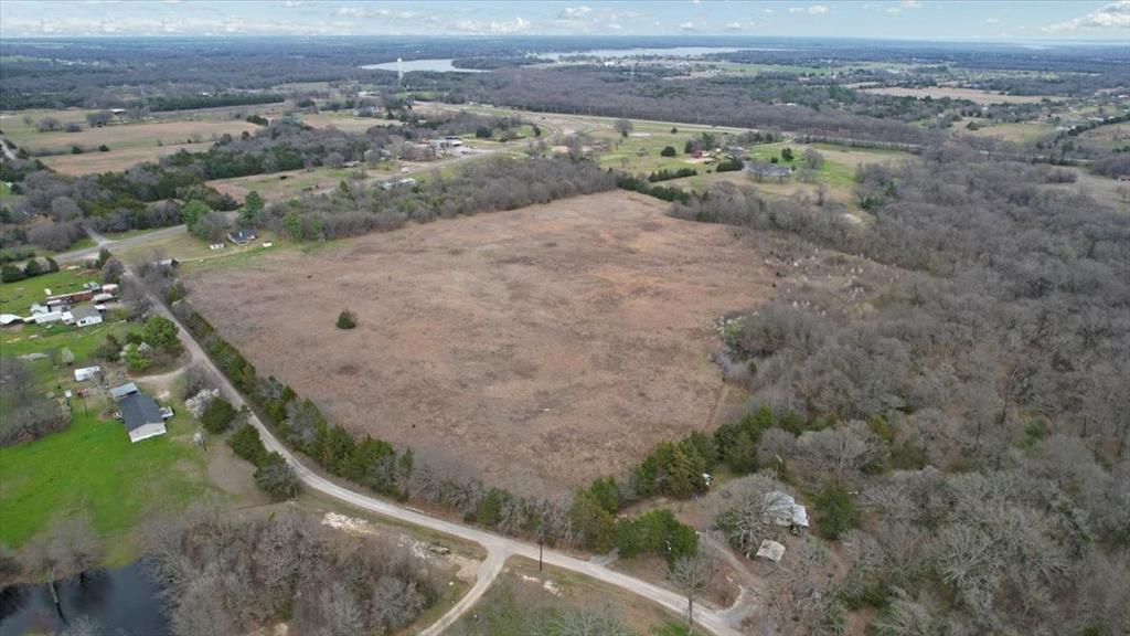 4400 Highway 121 Bonham, TX 75418 - Photo 33 of 40 an aerial view of a houses