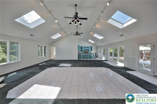 a room with a chair and wooden floor