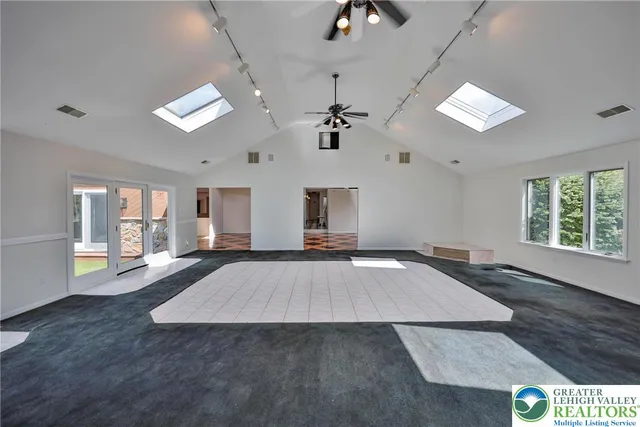 an empty room with windows