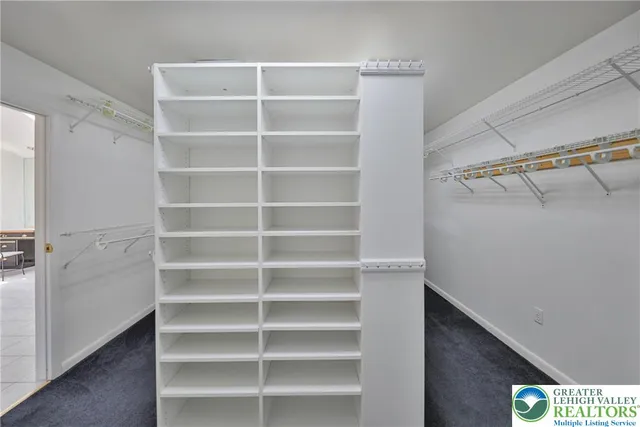 a view of a bedroom with window and window