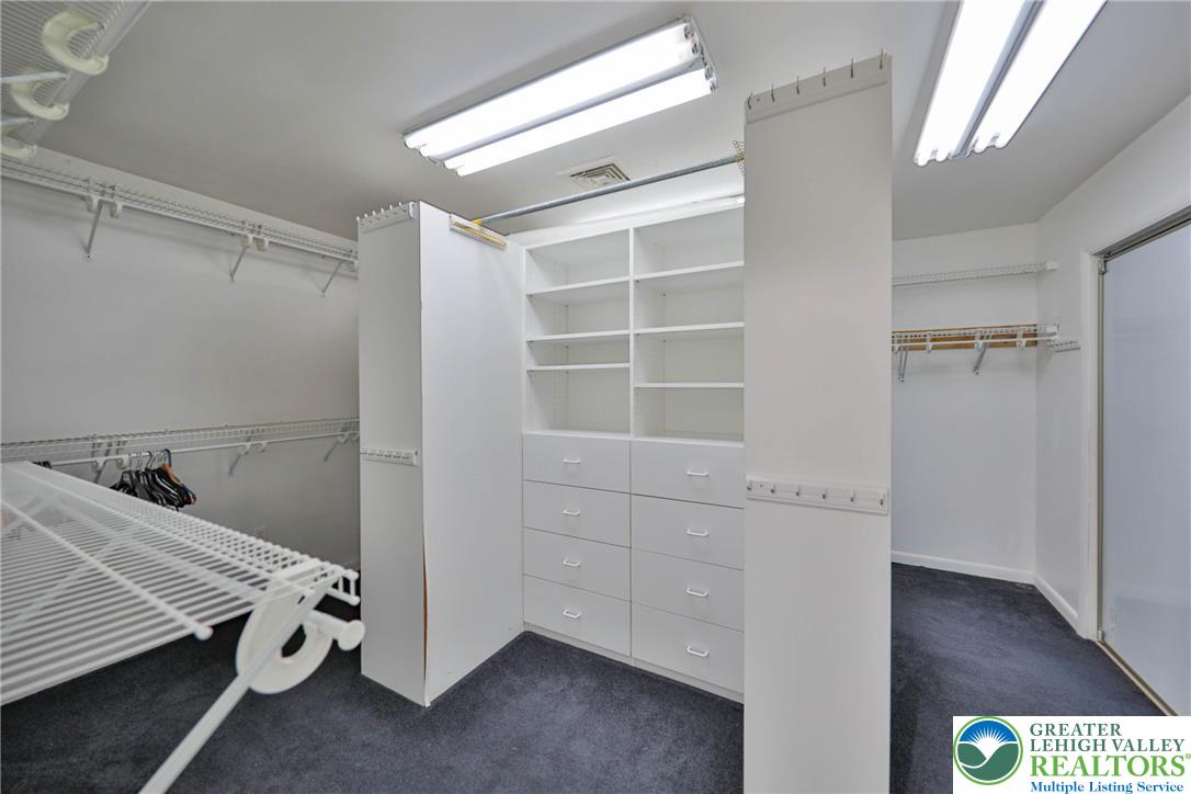 1015 Honeysuckle Road Walnutport, PA 18088 - Photo 25 of 75 a room with a chair and wooden floor