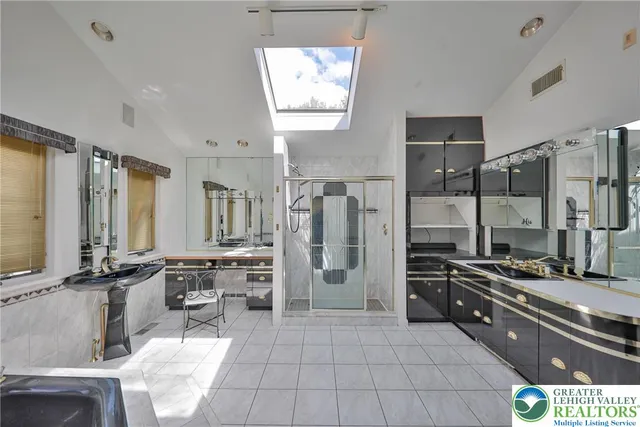 a kitchen with a stove a sink and a refrigerator