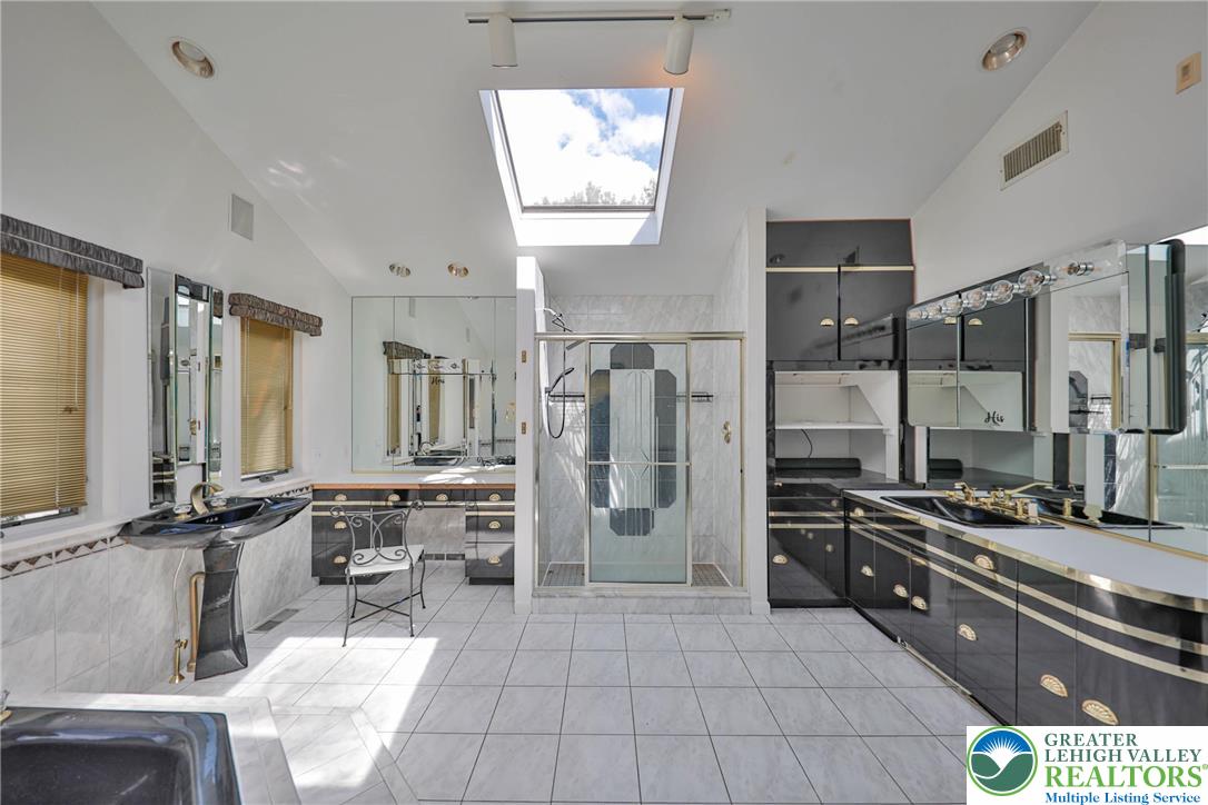 1015 Honeysuckle Road Walnutport, PA 18088 - Photo 27 of 75 a large kitchen with stainless steel appliances a stove a sink dishwasher and a refrigerator