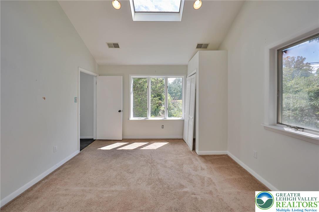 1015 Honeysuckle Road Walnutport, PA 18088 - Photo 29 of 75 a view of an empty room with a window