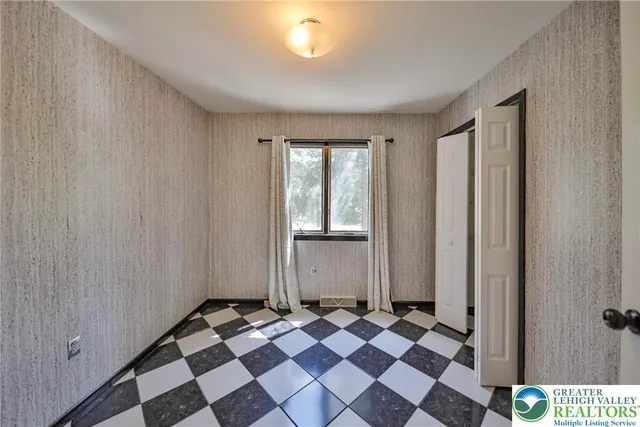 a view of a yard with patio