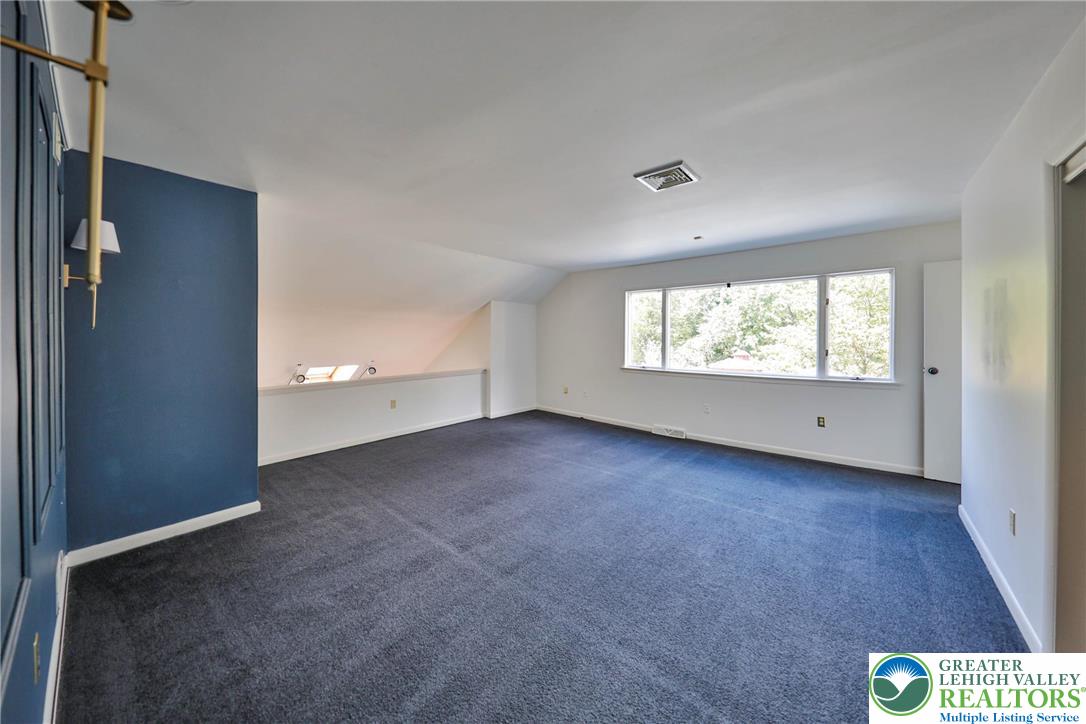 1015 Honeysuckle Road Walnutport, PA 18088 - Photo 40 of 75 a view of an empty room with a window