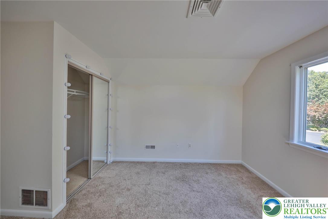 1015 Honeysuckle Road Walnutport, PA 18088 - Photo 47 of 75 an empty room with windows