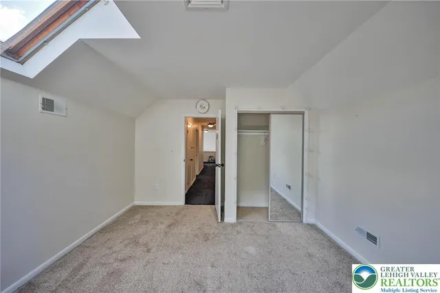 a front view of a house with swimming pool