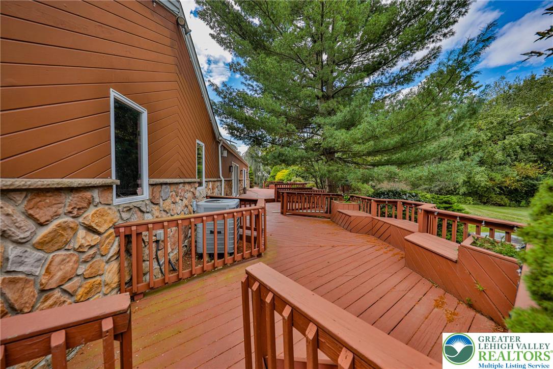 1015 Honeysuckle Road Walnutport, PA 18088 - Photo 54 of 75 a balcony with wooden floor and furniture