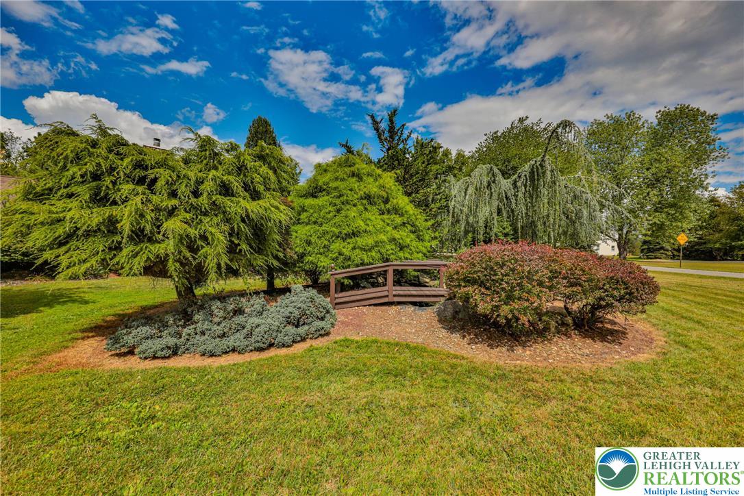 1015 Honeysuckle Road Walnutport, PA 18088 - Photo 60 of 75 a backyard of a house with lots of green space