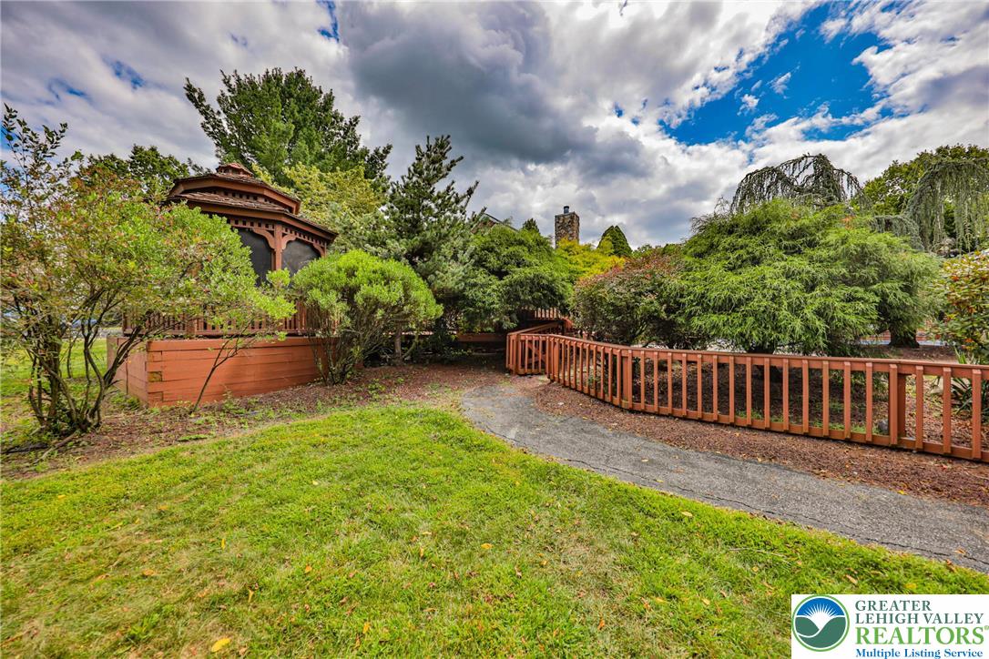 1015 Honeysuckle Road Walnutport, PA 18088 - Photo 67 of 75 a view of a yard with wooden fence