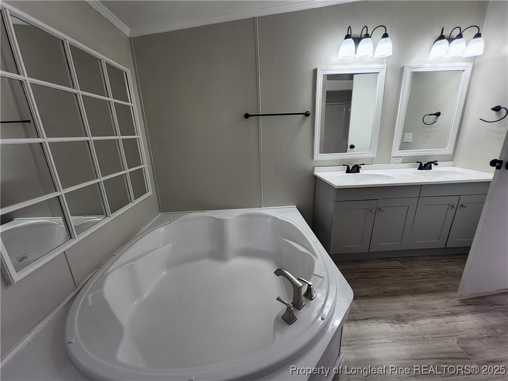 87 Drox Lane Clinton, NC 28328 - Photo 18 of 22 a bathroom with a tub sink and mirror