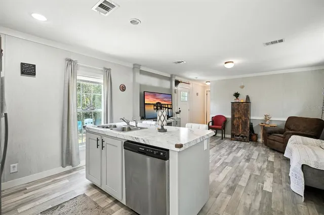 a bedroom with a bed and a book shelf